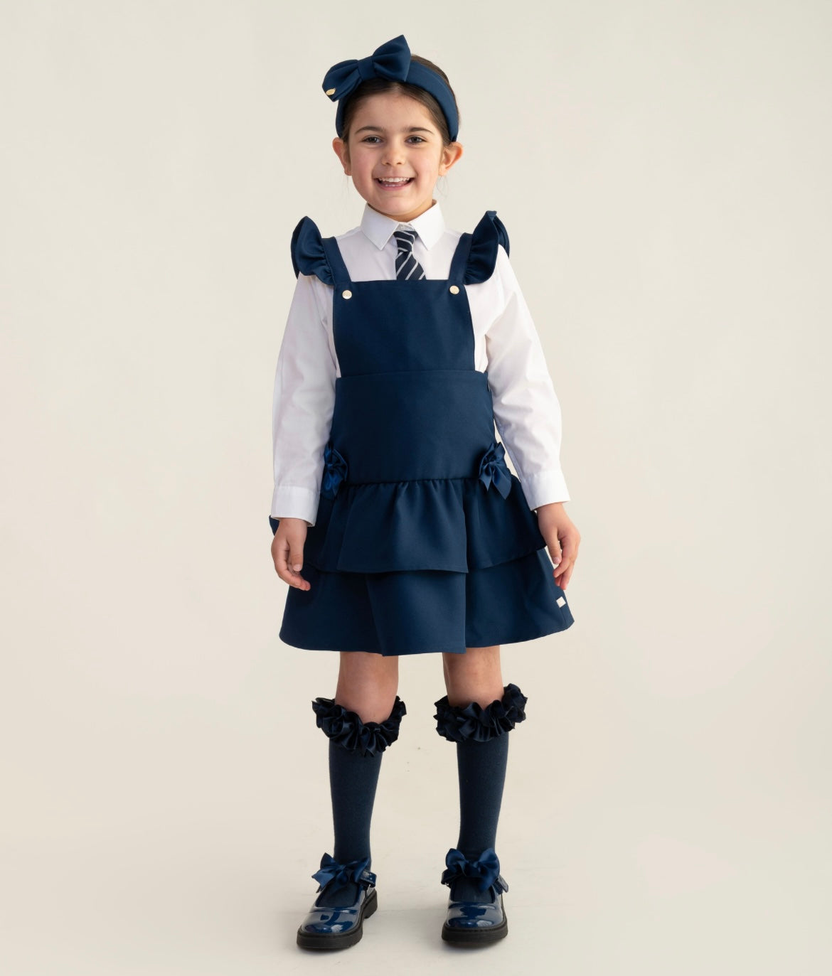 CARAMELO- Ra Ra bow Pinafore ( Navy)