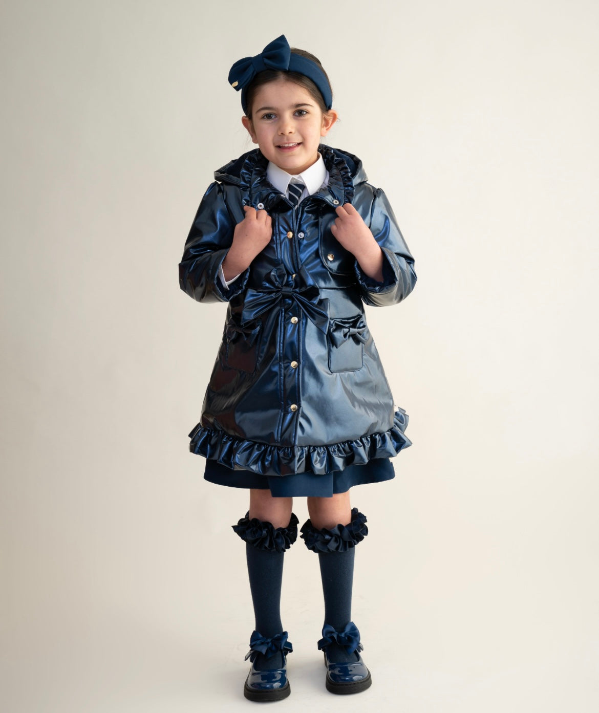 CARAMELO- Bow school raincoats