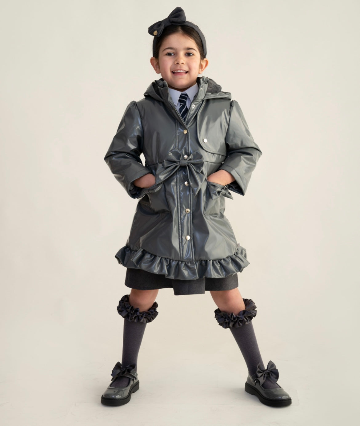 CARAMELO- Bow school raincoats